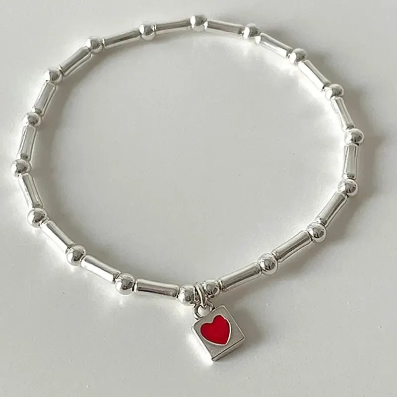 VAIGE Elegant Silver Bamboo Joint Red and Heart Accented Cuff Bracelet